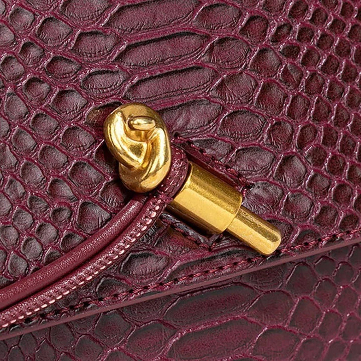 SERENA – Edle Baguette Bag in exotischer Python-Optik