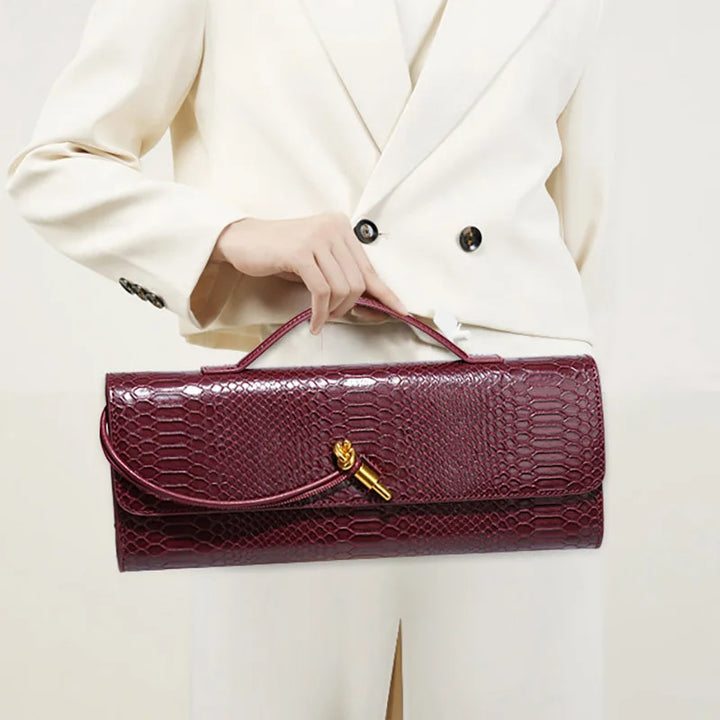 SERENA – Edle Baguette Bag in exotischer Python-Optik