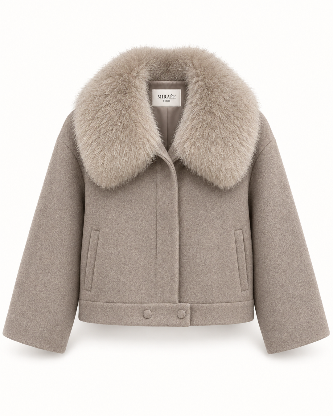 CELESTE Wolljacke in Haferbeige – freigestellte Produktansicht mit MIRAÉE Label