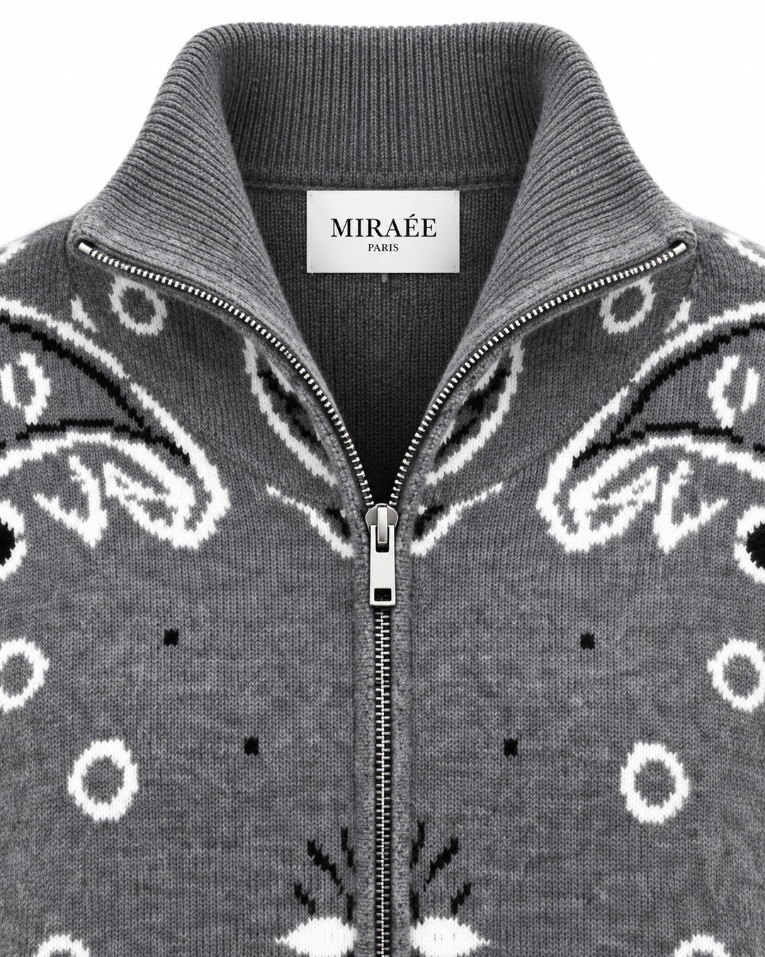 COLETTE Dunkelgrau – Detailaufnahme von MIRAÉE PARIS Label, Kragen, Reißverschluss und Strickstruktur