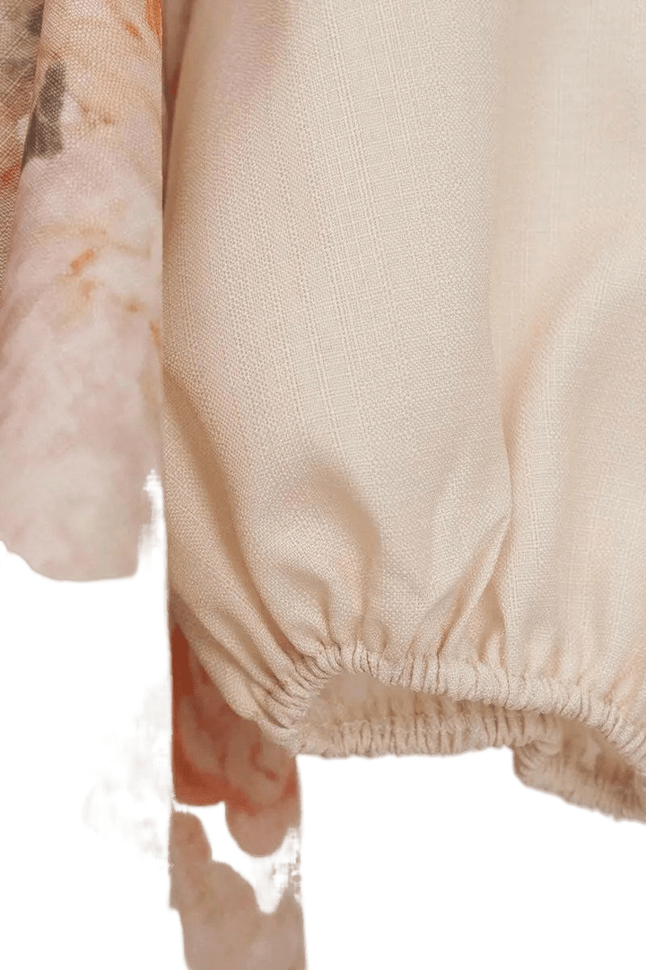 Elegantes Maxikleid mit floralem Print und Puffärmeln - Miraee Paris