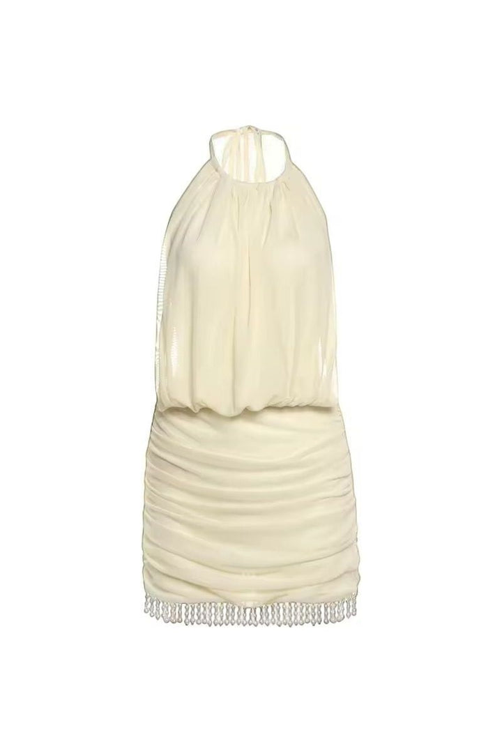 Mirae Paris butter yellow halter neck mini dress with ruched skirt and beaded hem. Soft, feminine, and elegant.
