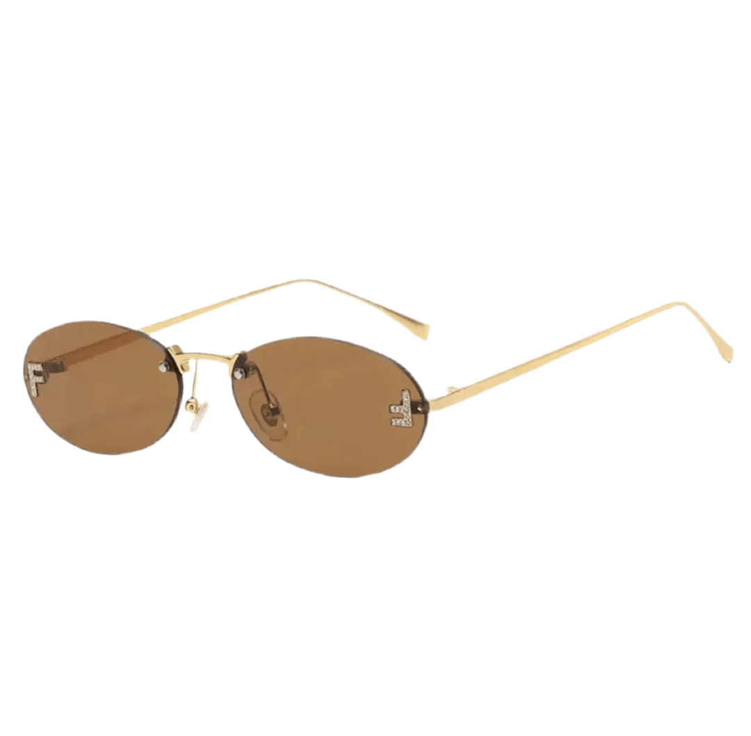 Sonnenbrille mit goldfarbenem Rahmen & Kristalldetails – Damen Accessoire mit Stil.