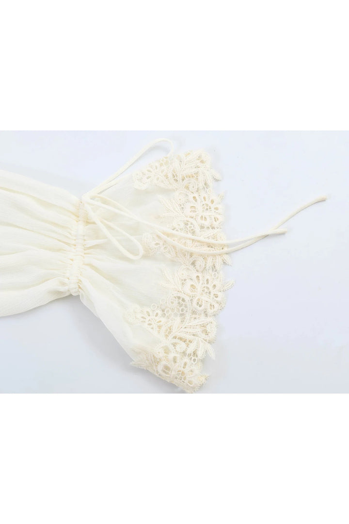 Miraee Paris cream lace blouse sleeve detail with delicate floral embroidery, ruffled trim, and adjustable tie strings