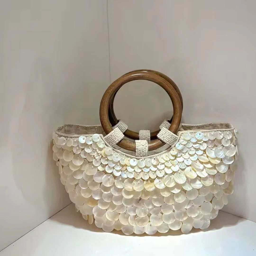 Boho Chic Perlmutt-Tasche mit Holzgriffen.