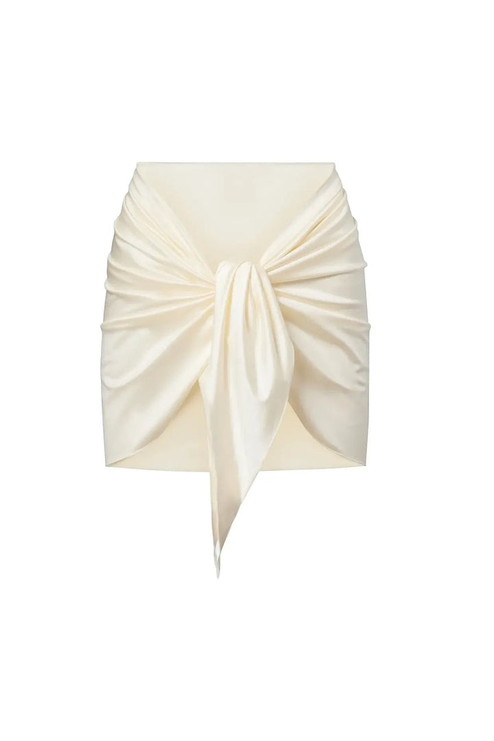 Miraee Paris Emma Pearl bikini set cream sarong skirt with front tie detail for a glamorous beach look.
