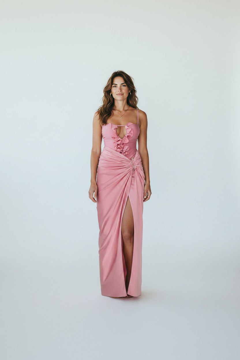 Miraee Paris Lara pink one-piece swimsuit with ruffled neckline and matching floor-length wrap cover-up skirt.