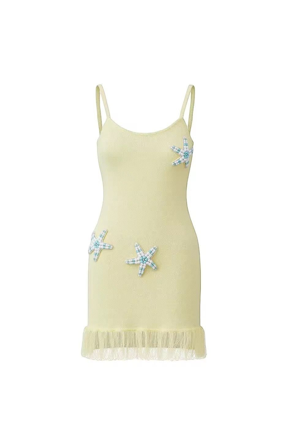 Miraee Paris Stella Mare lemon cream knit mini dress with spaghetti straps, starfish embellishments, and fringe hem.