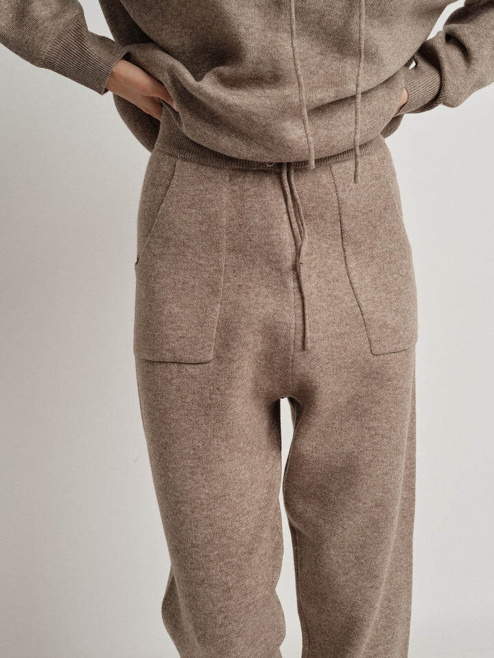 Bella Cashmere Lounge Set in soft brown, featuring a cozy hoodie and comfortable jogger pants for stylish relaxation.
