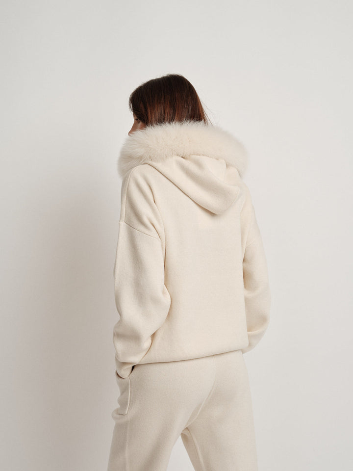 Bella Cashmere Lounge Set in cream with luxurious faux fur hood, perfect for stylish casual outfits.