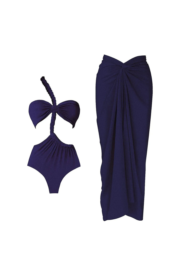 Miraee Paris Sophia one-shoulder bikini set in deep blue with a matching sarong cover-up and elegant ruched details.
