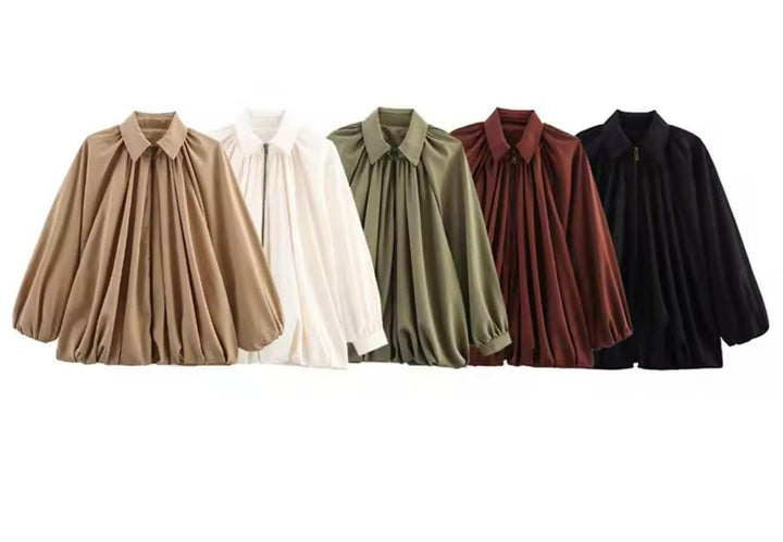 Miraéeparis Oversize Plissee-Bluse mit Ballonärmeln.