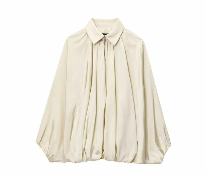 Miraéeparis Oversize Plissee-Bluse mit Ballonärmeln.