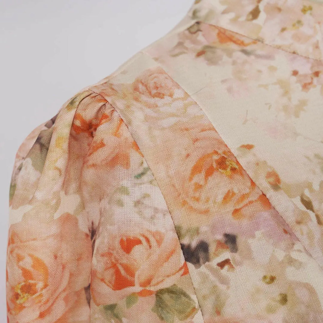 Elegantes Maxikleid mit floralem Print und Puffärmeln – Miraée Sommerkleid mit Gürtel.