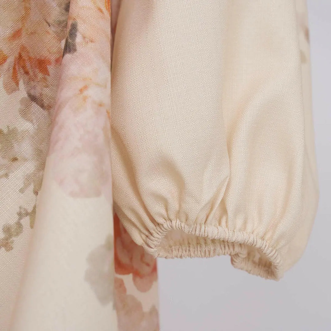 Elegantes Maxikleid mit floralem Print und Puffärmeln – Miraée Sommerkleid mit Gürtel.