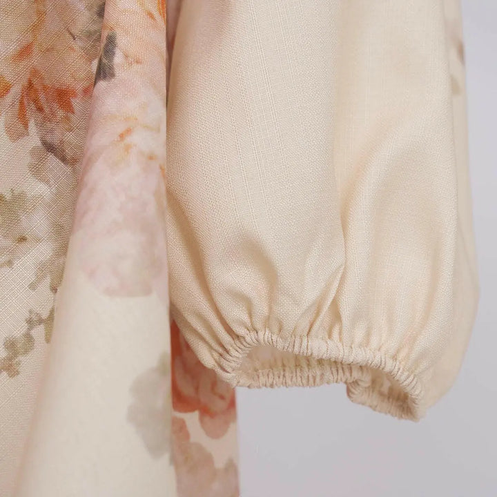 Elegantes Maxikleid mit floralem Print und Puffärmeln – Miraée Sommerkleid mit Gürtel.